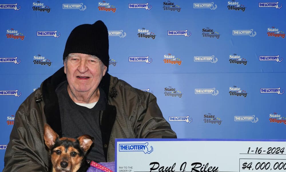 Lottery Winner Claims $4 Million Prize With His Dog, Plans To Donate To Animal Rescue