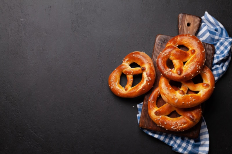 Freshly baked petzels on a cutting board